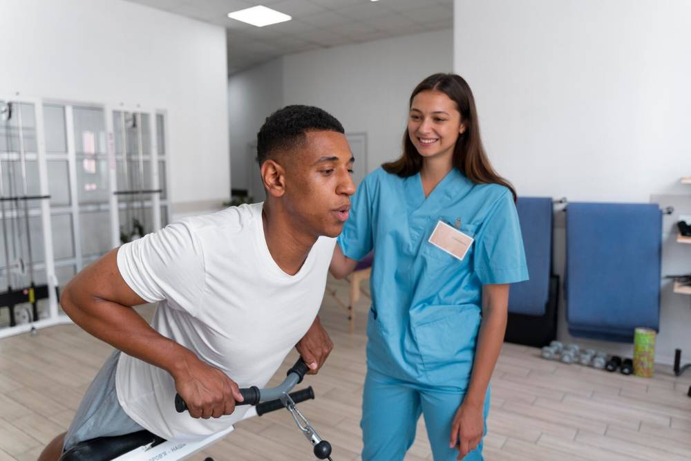 A patient receives physical rehabilitation support in a Partial Hospitalization Program in Columbus Ohio, guided by a professional healthcare provider.