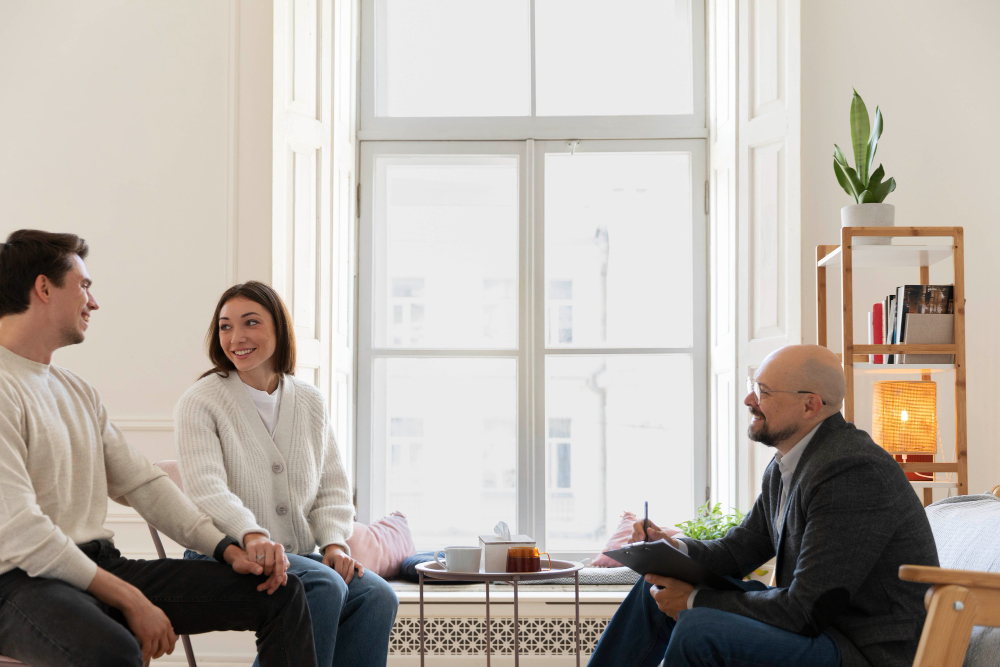 Couple speaking with a counselor during heroin addiction treatment in Columbus, OH at Forward Health Ohio